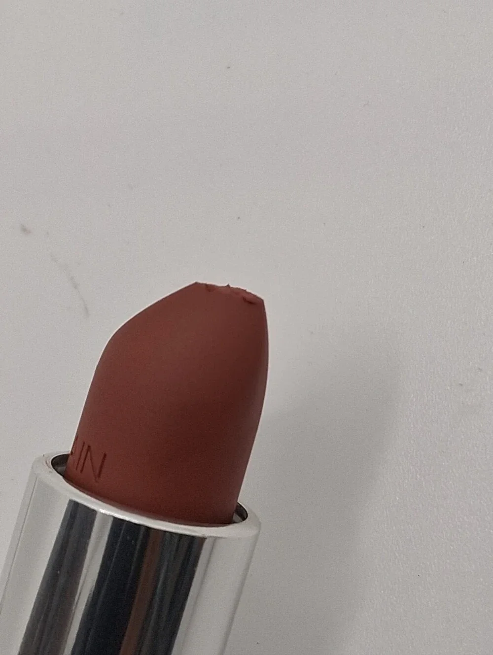 Guerlain #04 is a very warm-toned, light-medium copper semi-matte finish/new No